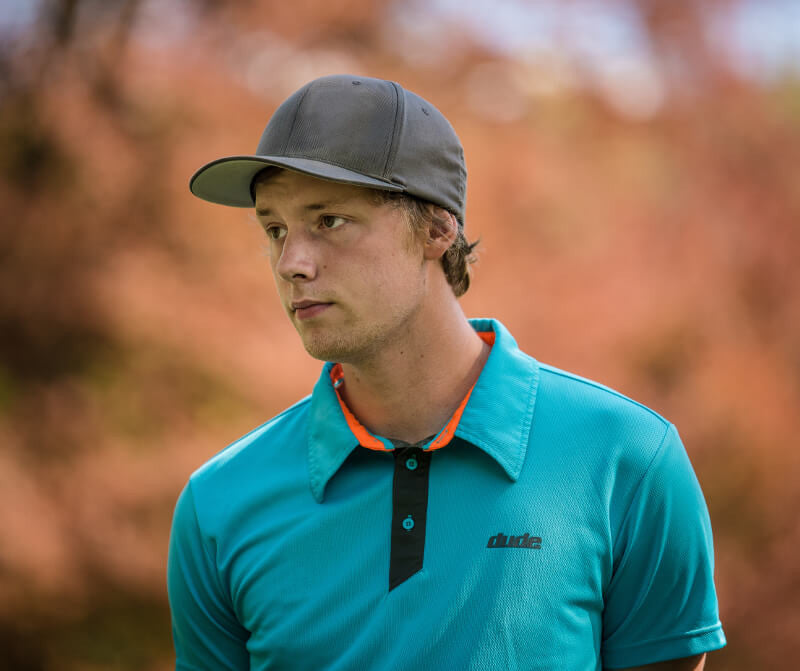 An image of Dude Pro Polo in aqua/navy color with Printed Logo on chest