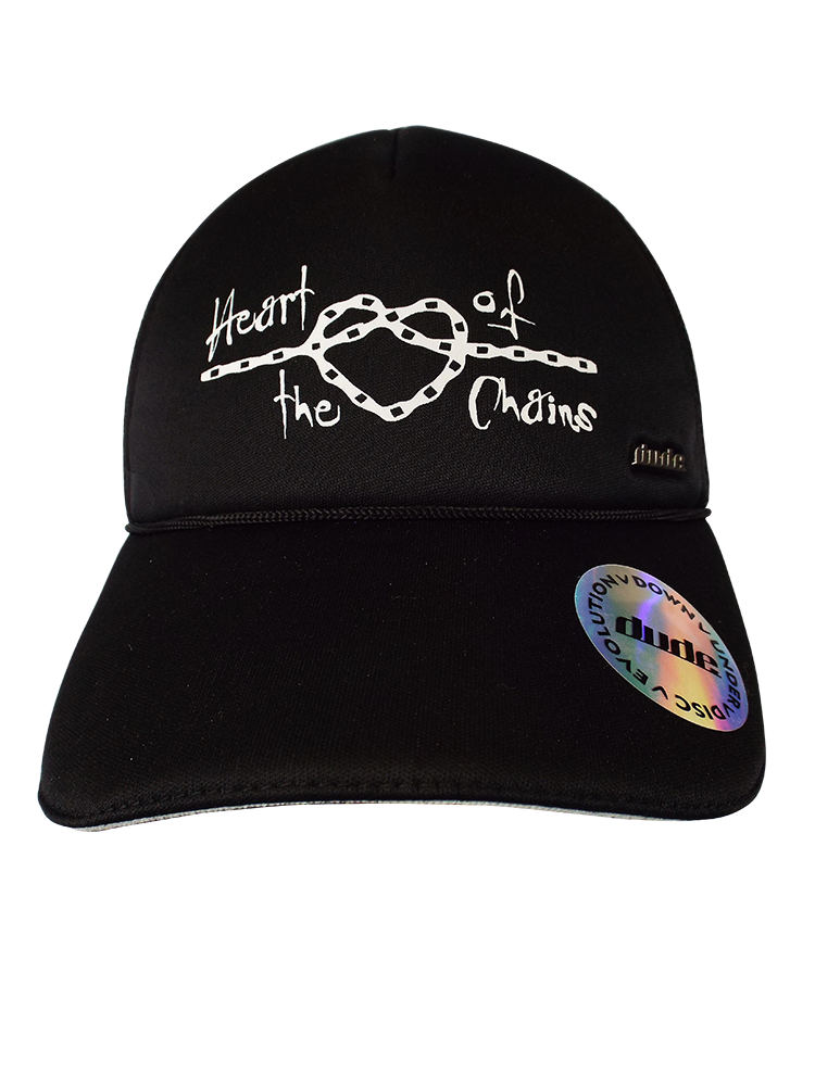 An image showing Kona Trucker Cap, stitching "heart of the  chains" front with dude logo.