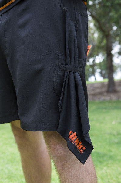 An image showing Dude Tech Caddie Shorts in black color with Integrated towel attachment system.