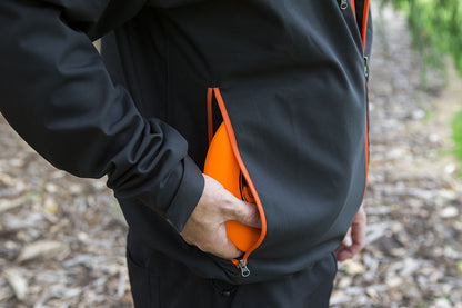 An image showing Dude Tech Caddy Jacket in black with Large welded side zips to stash up to 6 discs