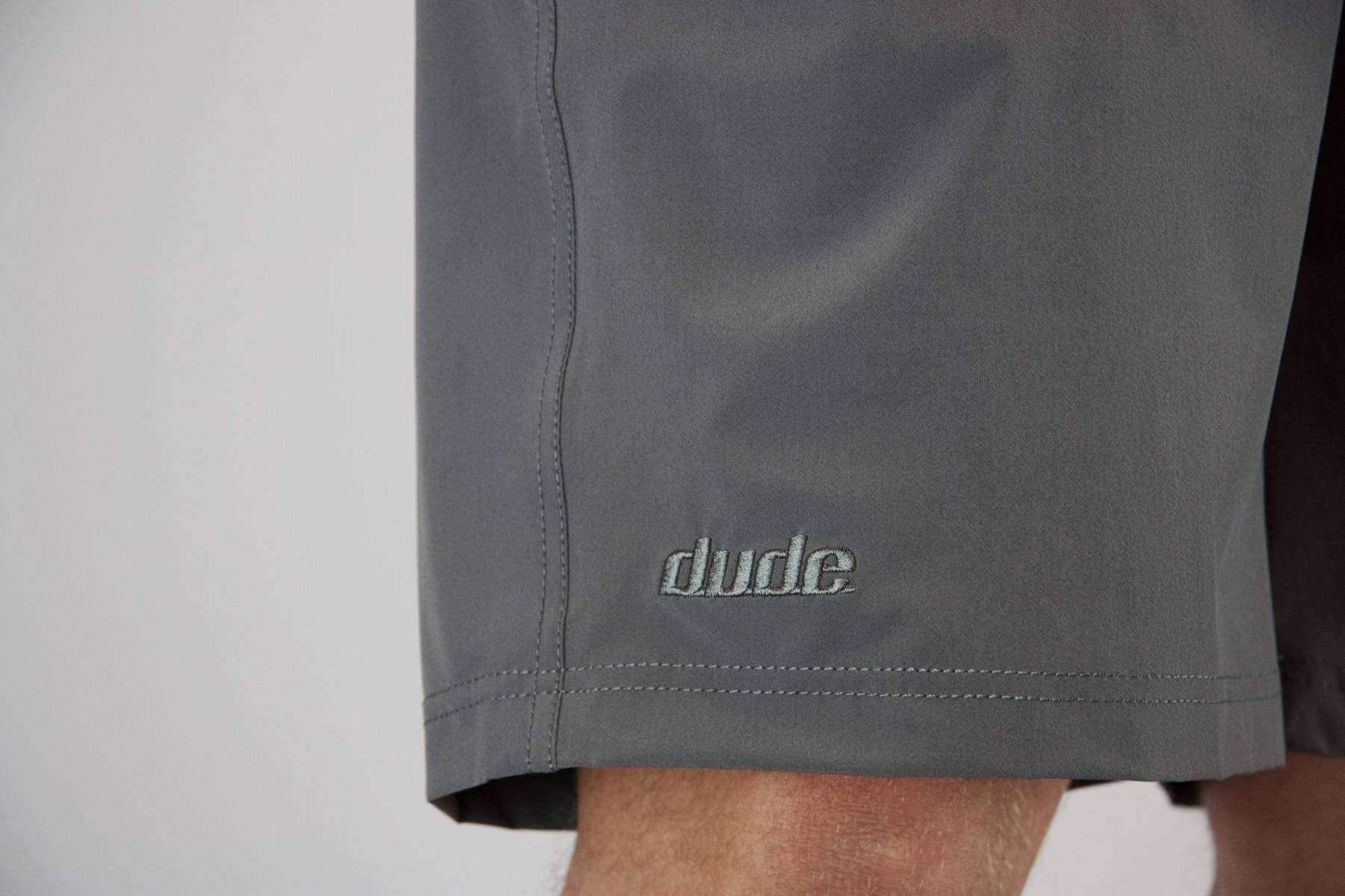 An image showing  Dude Pro Shorts 21" outleg in grey color with Dude stud closure